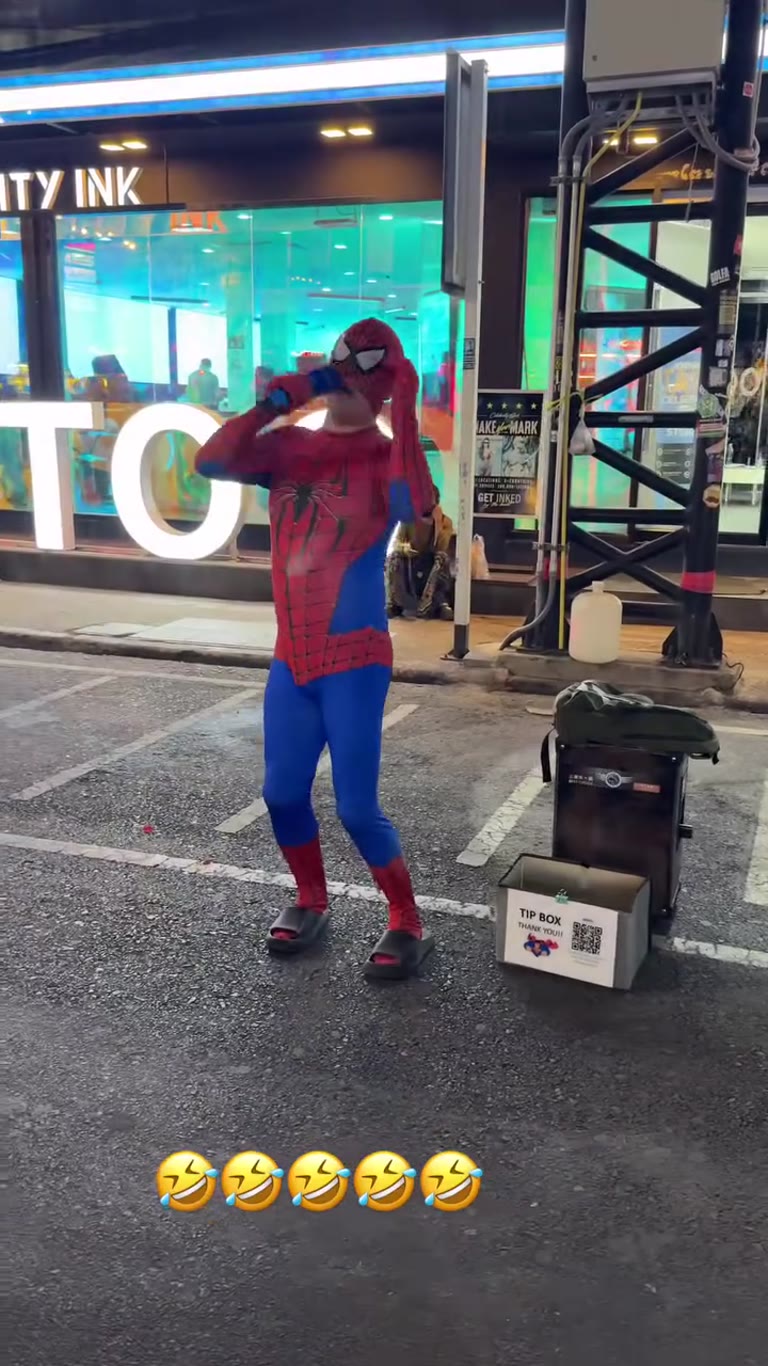 Singing Spider-Man busker on Phuket's street