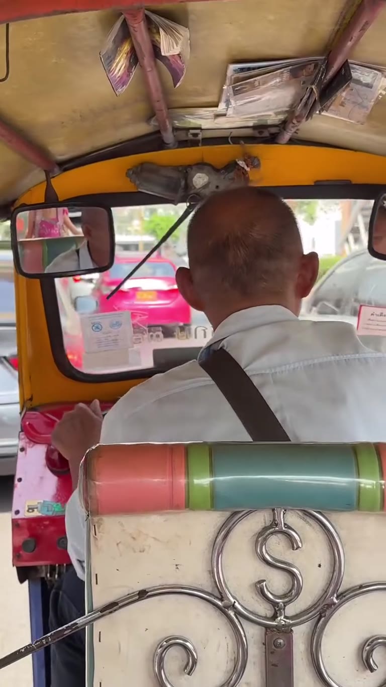 Tuk-tuk ride through Bangkok traffic