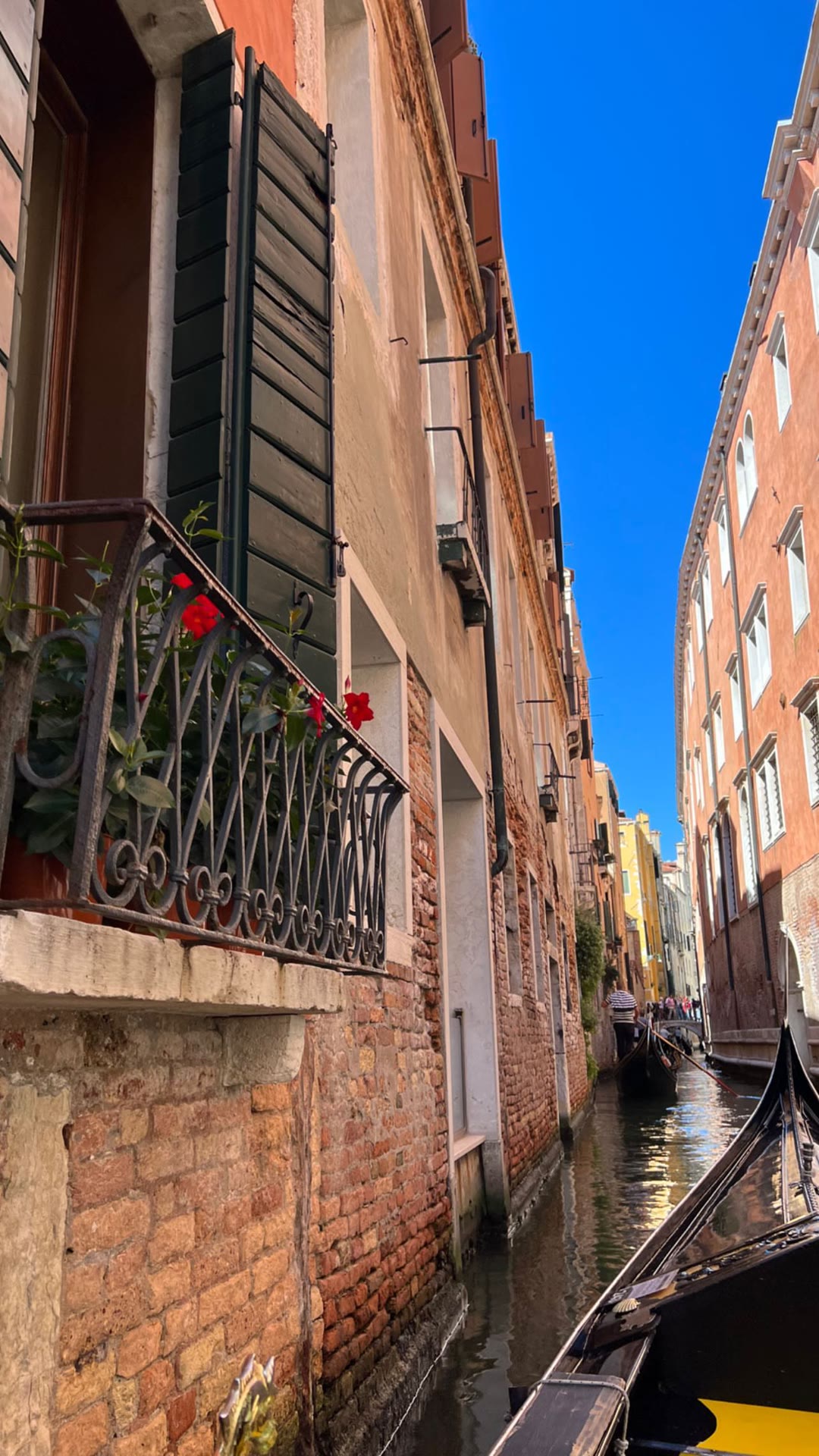 Gondola ride through a Venice side canal