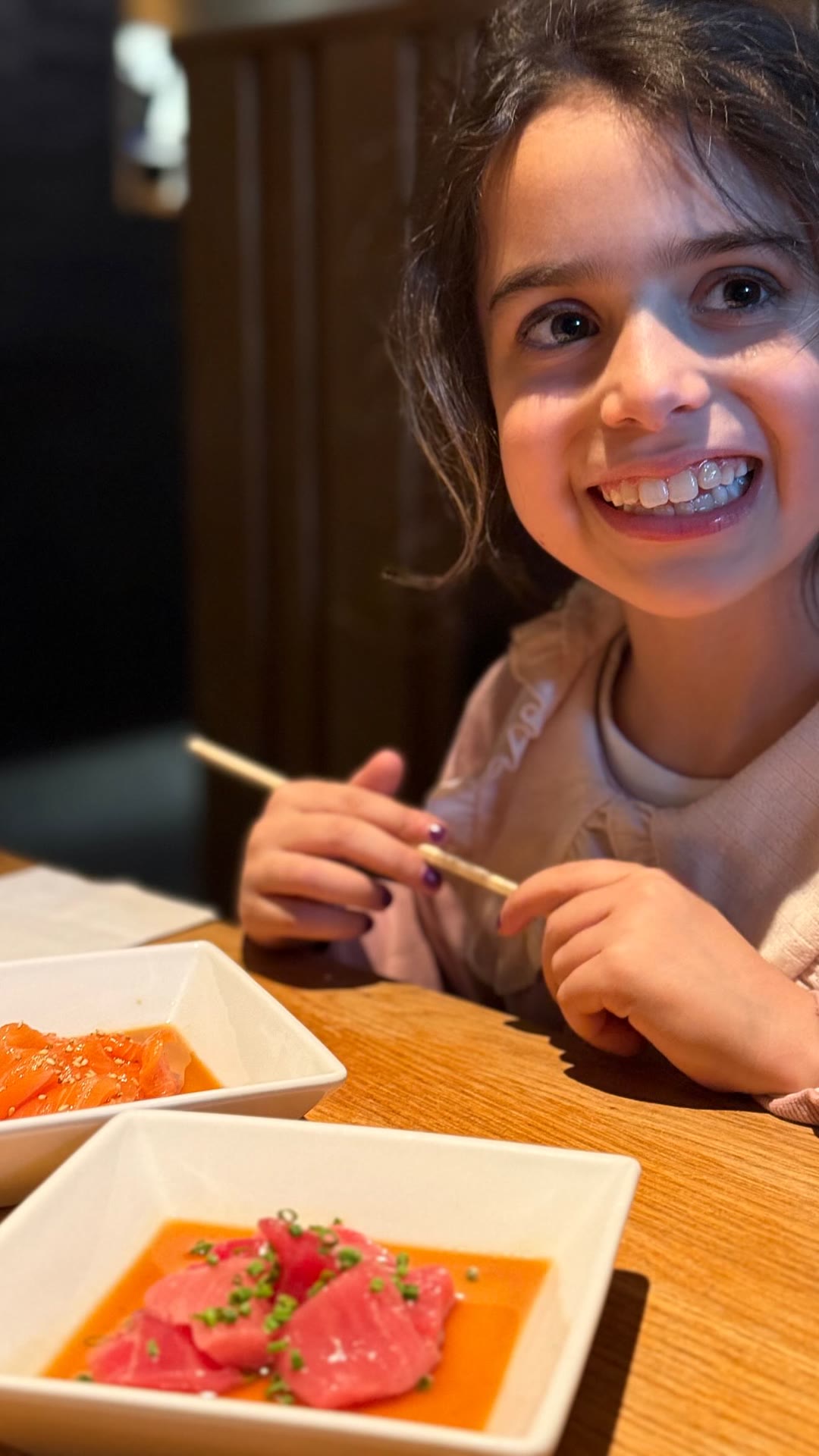 Sashimi lunch with a happy kid in New York