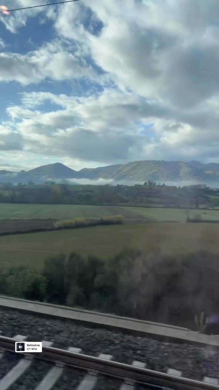 Train window views through the Italian countryside