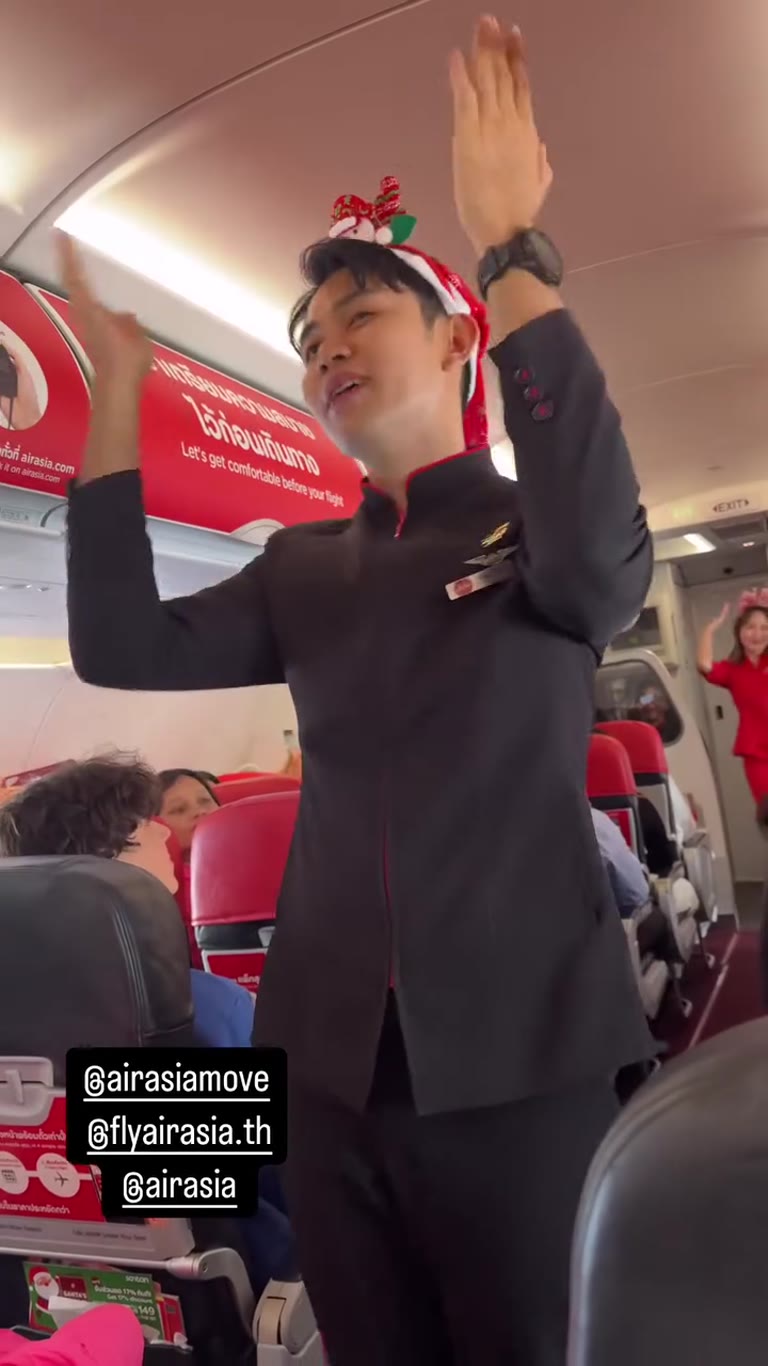 AirAsia crew Christmas sing-along mid-flight