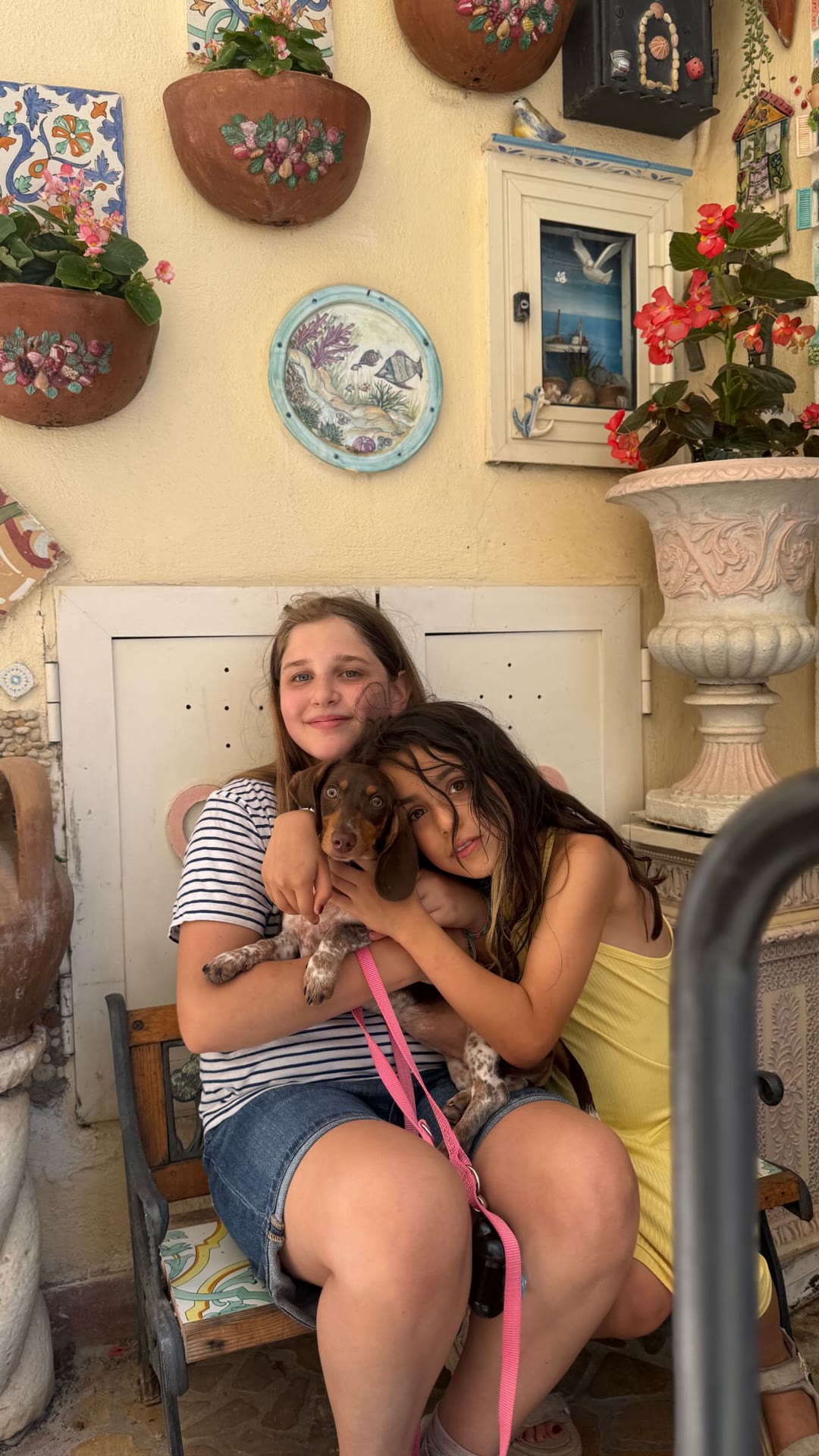 Girls and a puppy on a day trip outside Rome