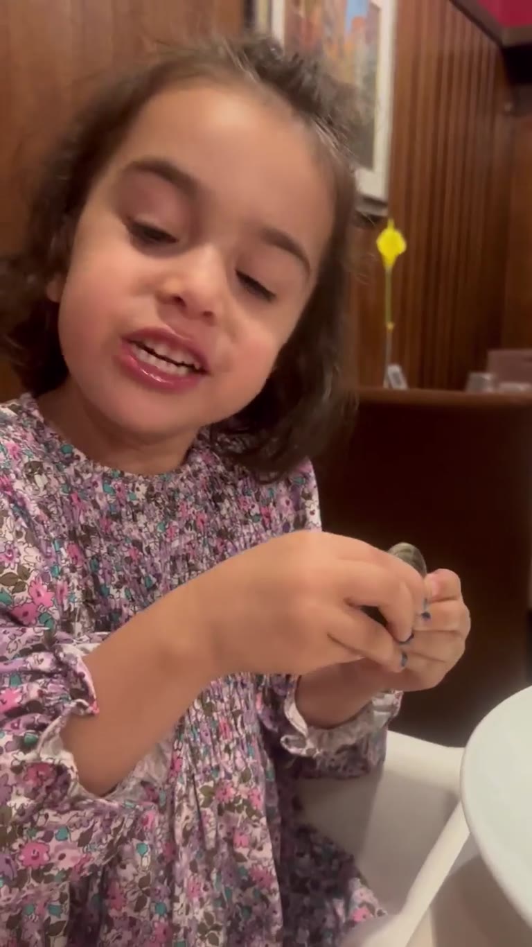 Daughter at dinner during Venice trip