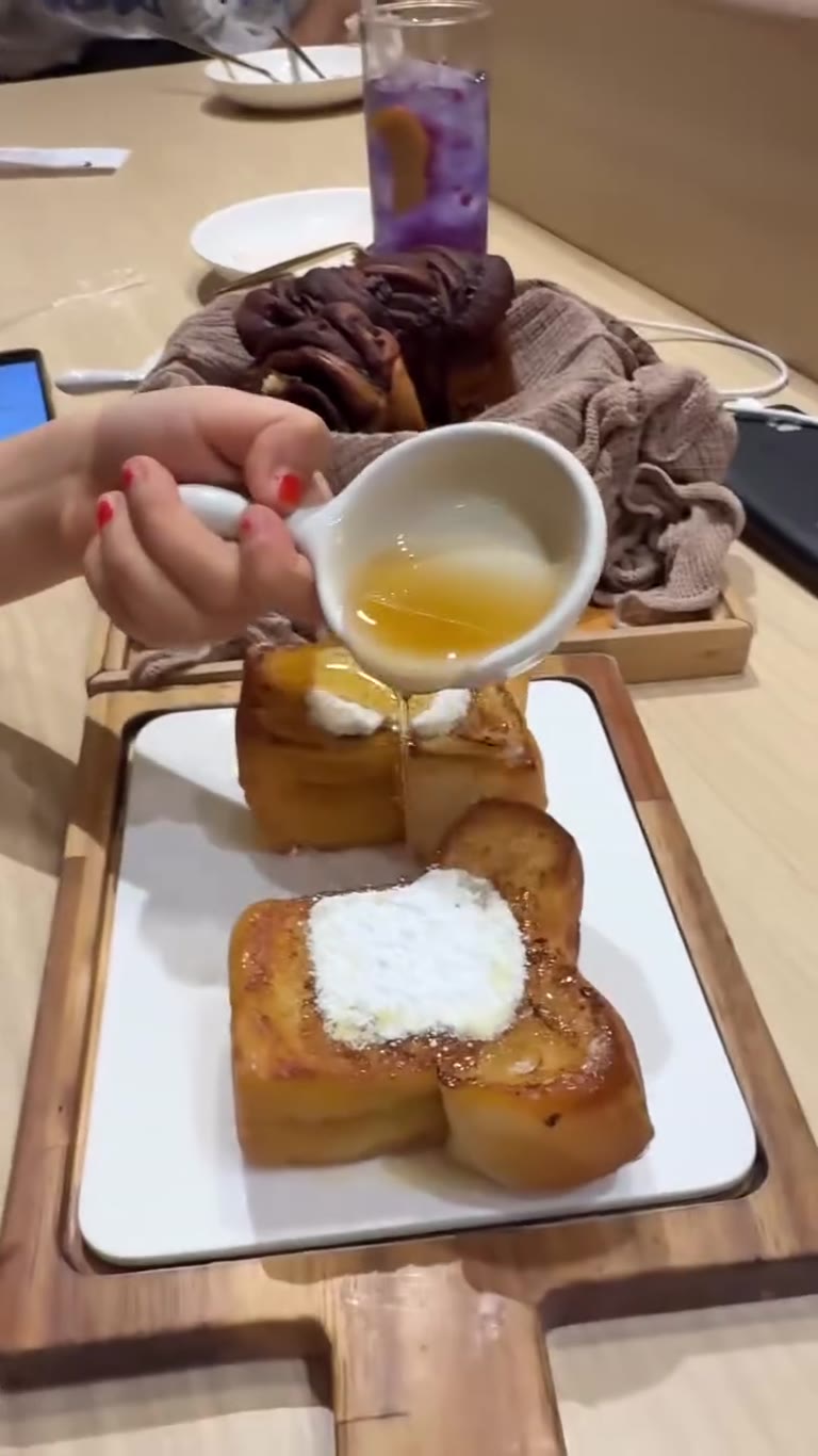 Honey-drizzled French toast in Bangkok