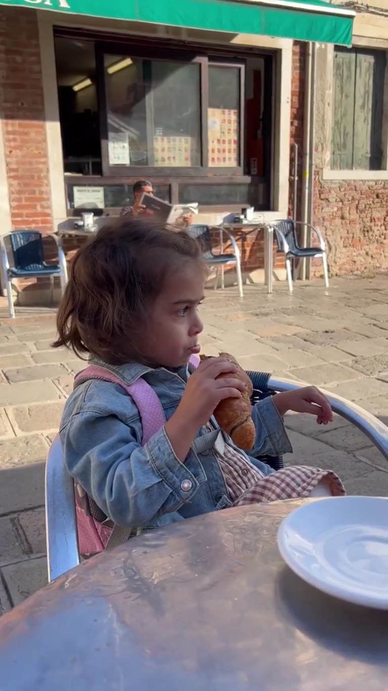 Morning croissant at a Venice café terrace