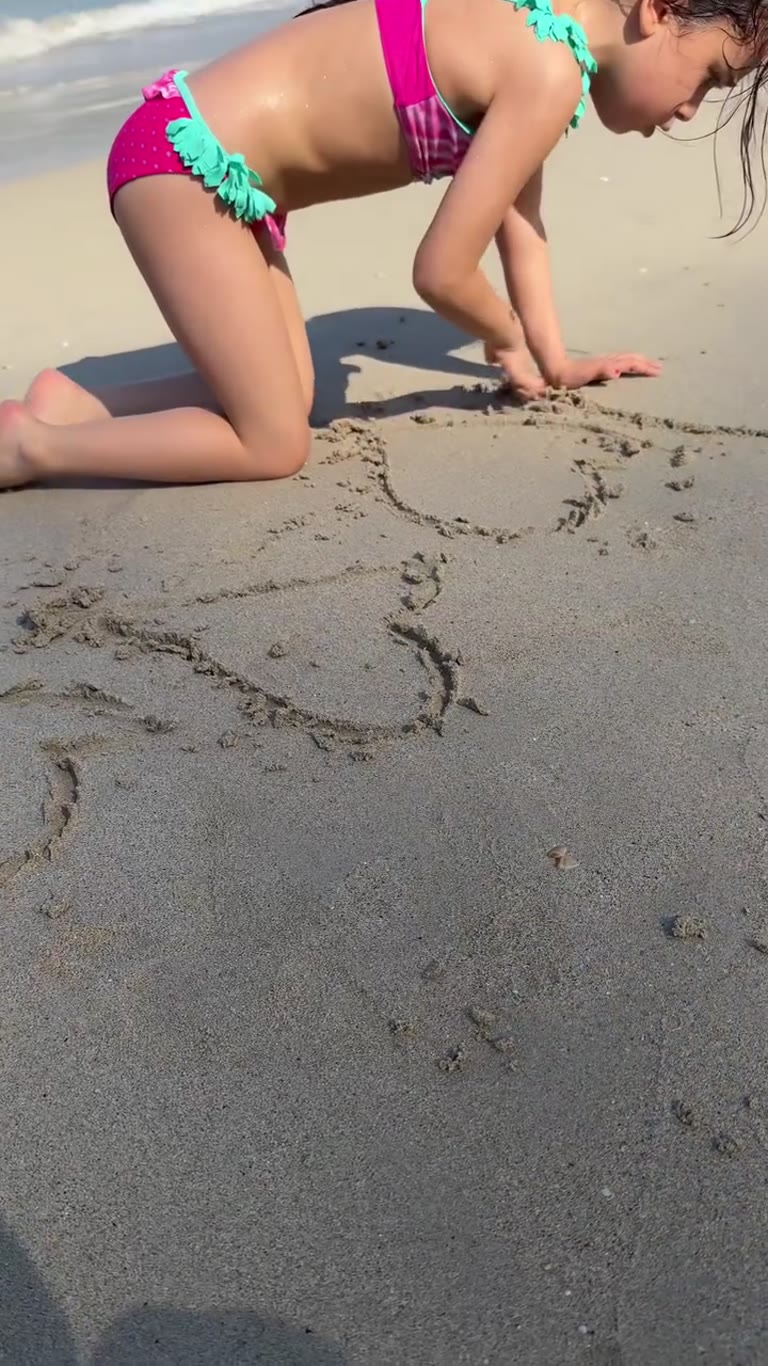 Beach day in Phuket with sand drawings