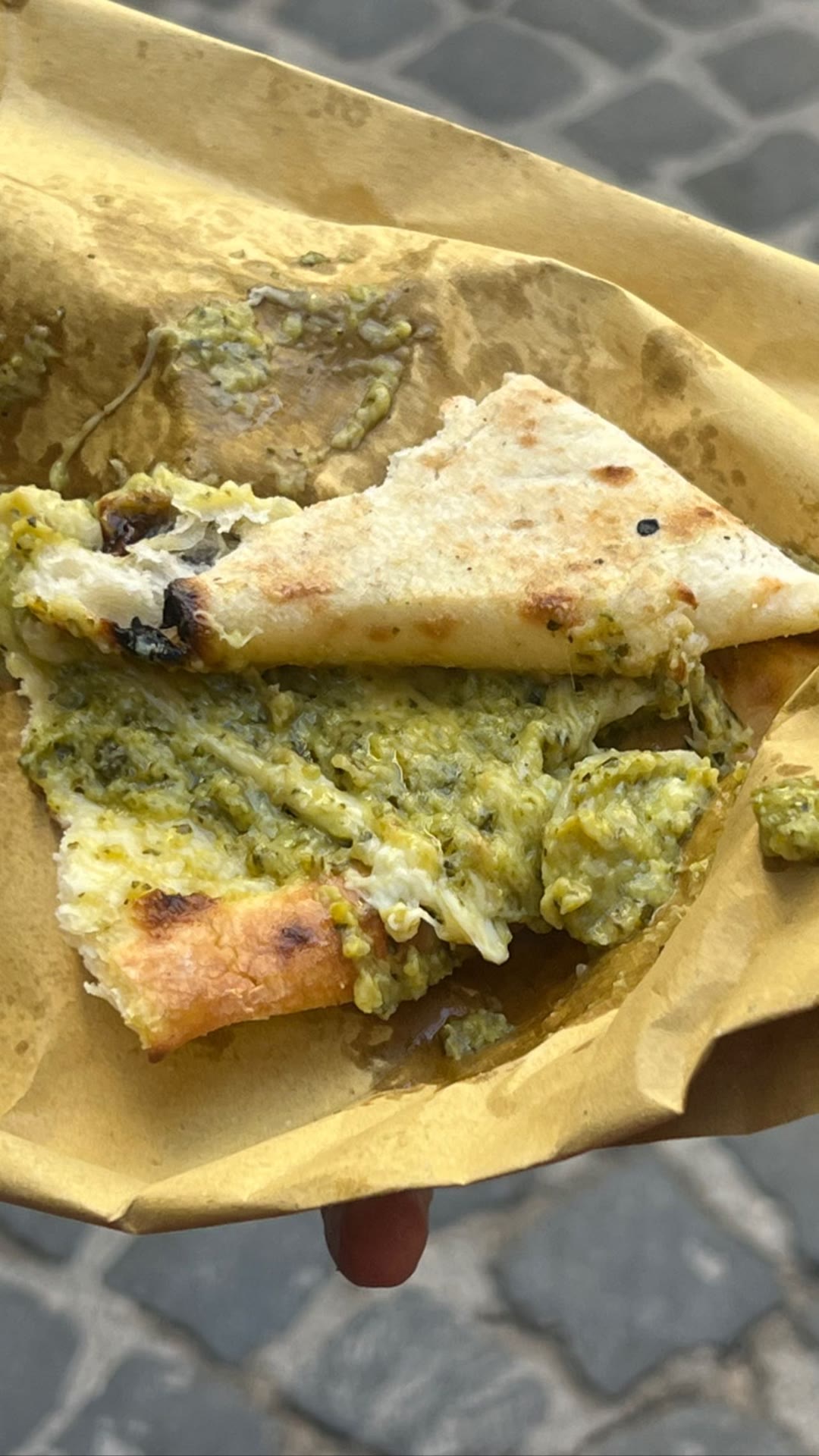 Broccoli-and-cheese street pizza in Naples
