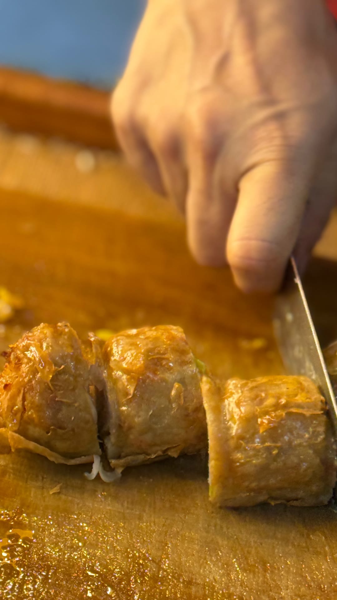Street food spring rolls sliced in Bangkok