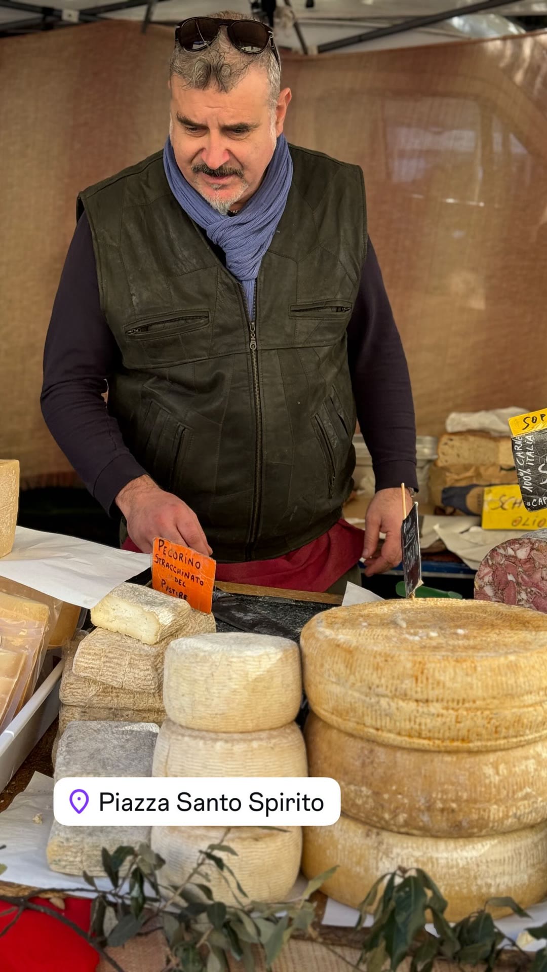 Cheese stall at Piazza Santo Spirito market