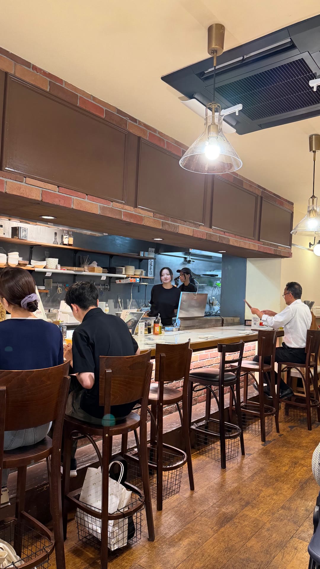 Counter seats at a small Japanese eatery