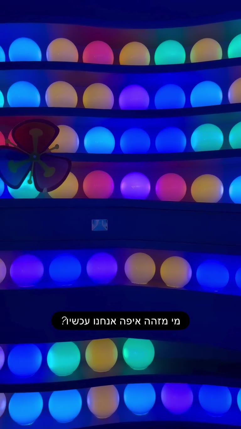 Guess where: glowing colored orb wall in Japan