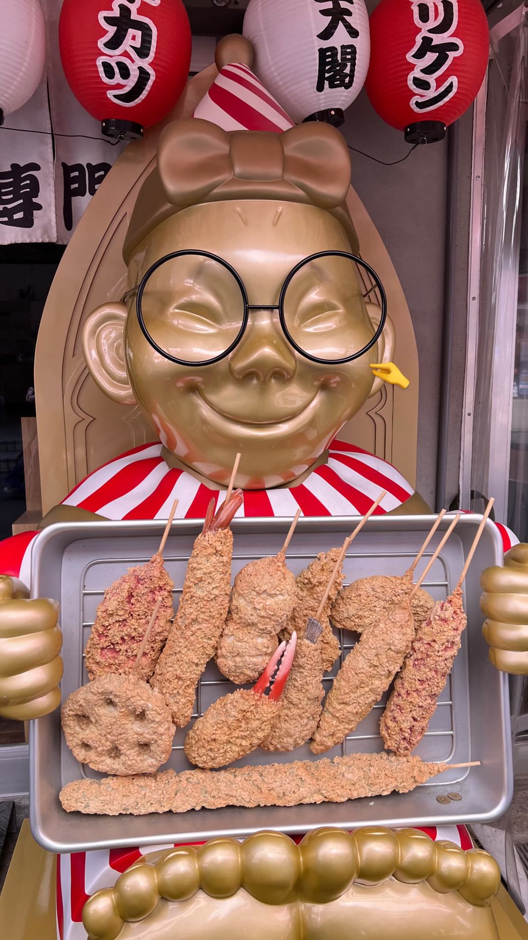Kushikatsu shop mascot in Shinsekai, Osaka