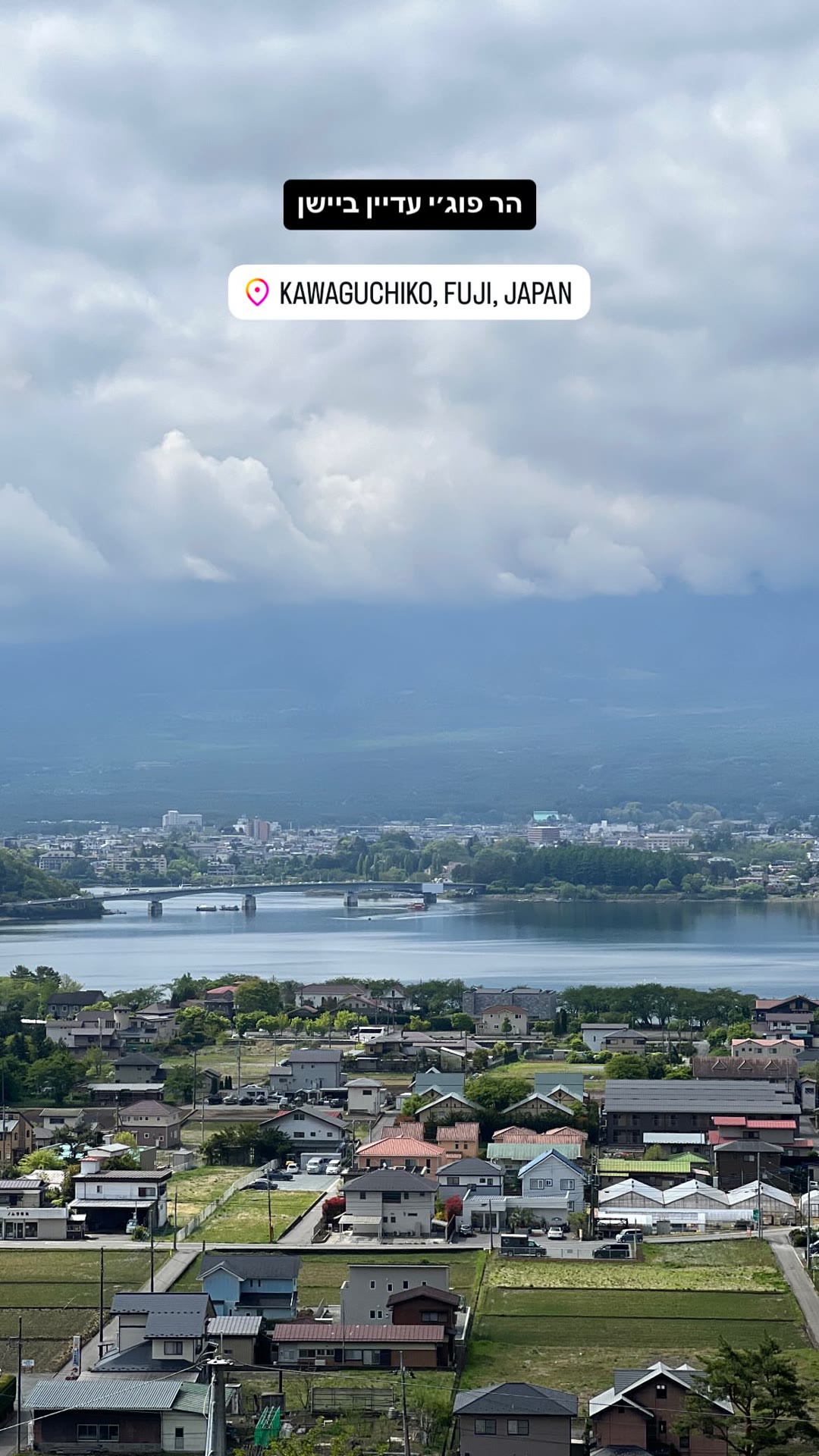 Mt. Fuji hiding behind clouds over Kawaguchiko