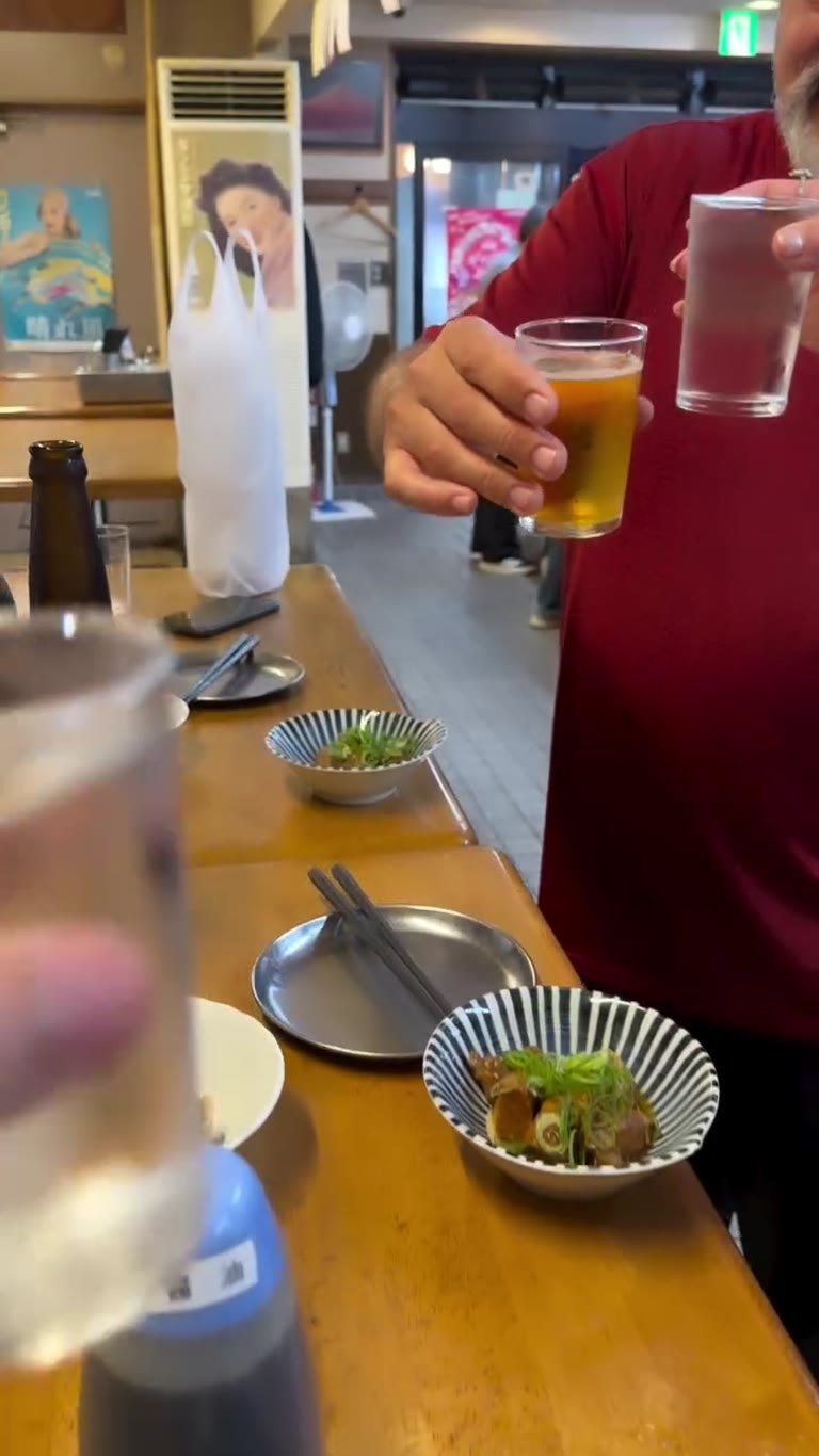 Kanpai at an Osaka izakaya food tour