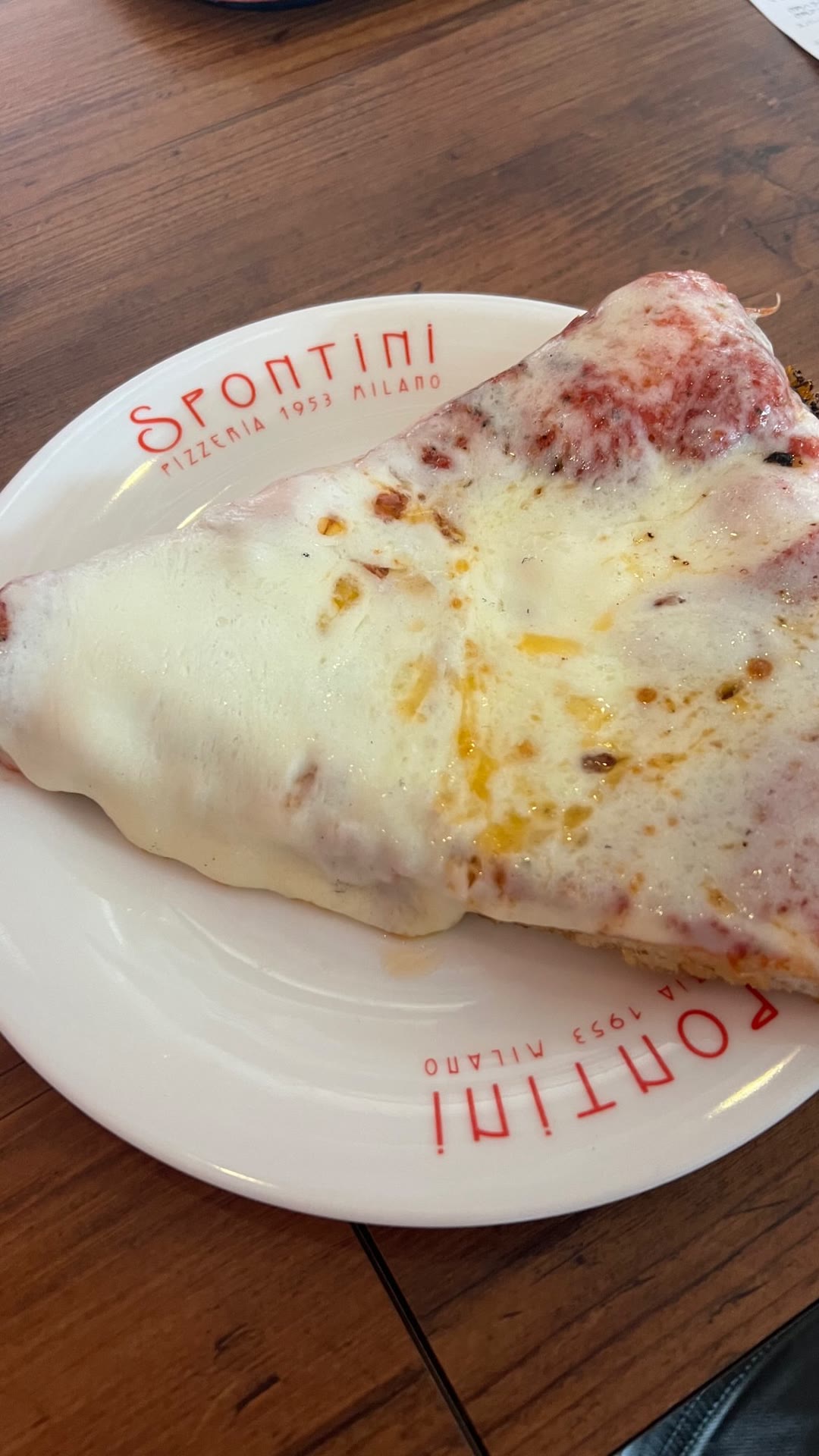 Spontini pizza slice in Tokyo