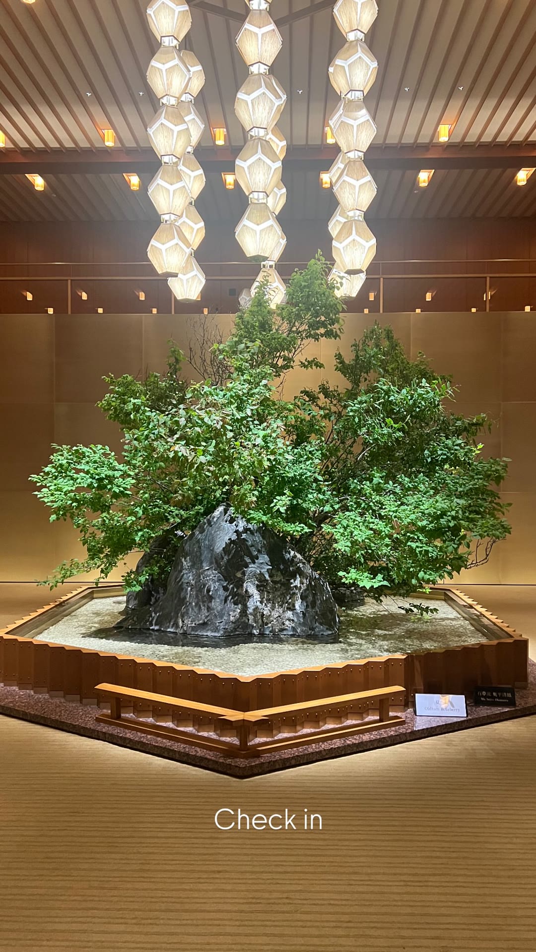 Check-in at a Tokyo hotel lobby with Okura lanterns
