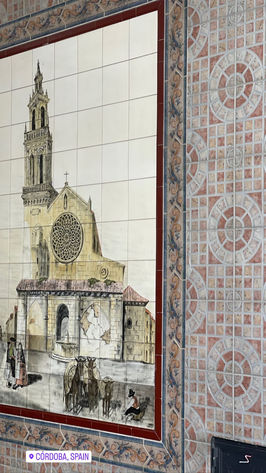 Painted tile mural in Córdoba