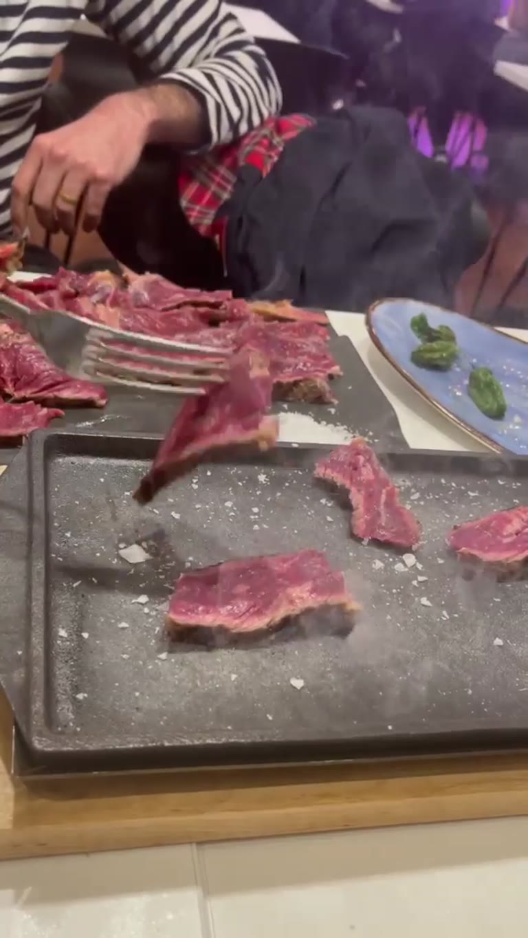 Steak cooked on a hot stone in Barcelona