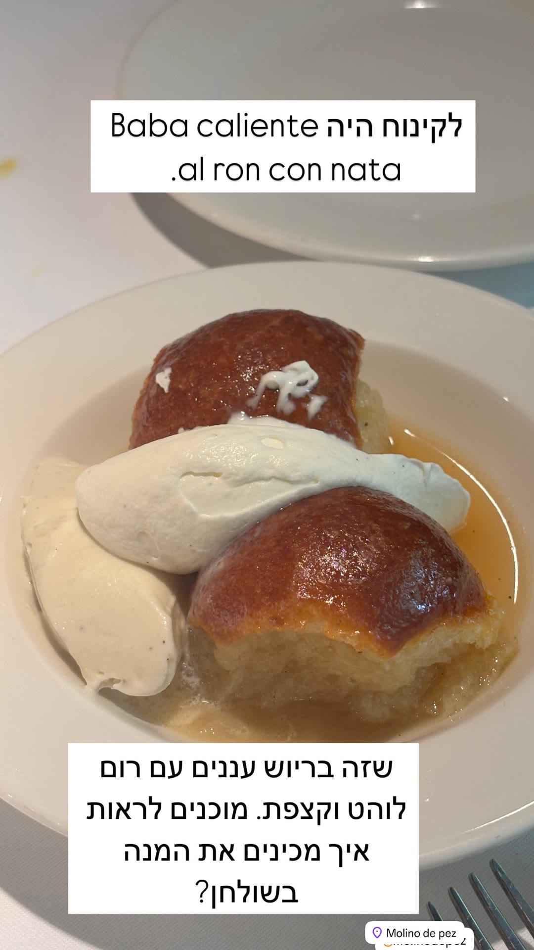 Baba al ron con nata at Molino de Pez, Barcelona