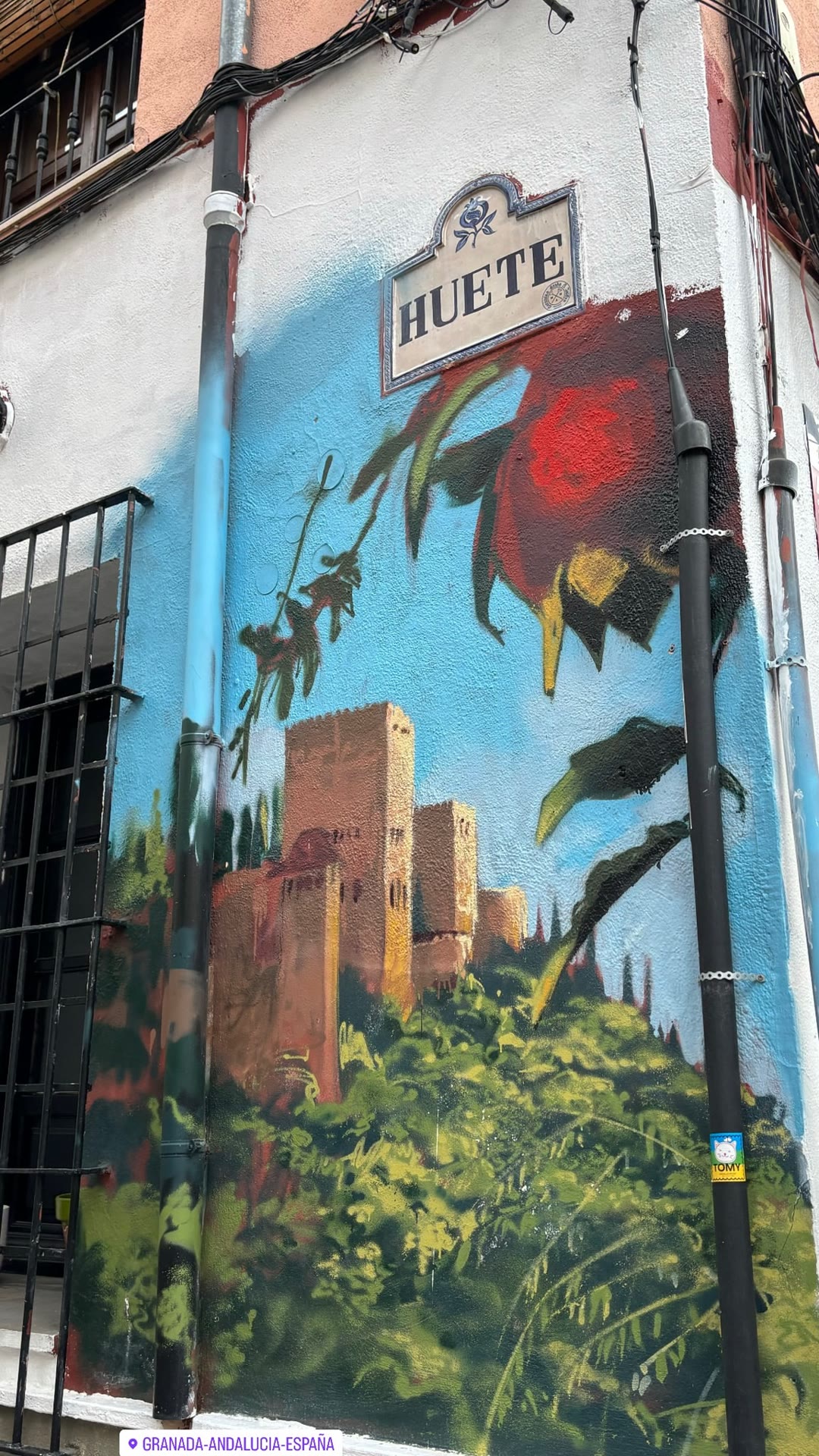 Alhambra street mural on Calle Huete, Granada