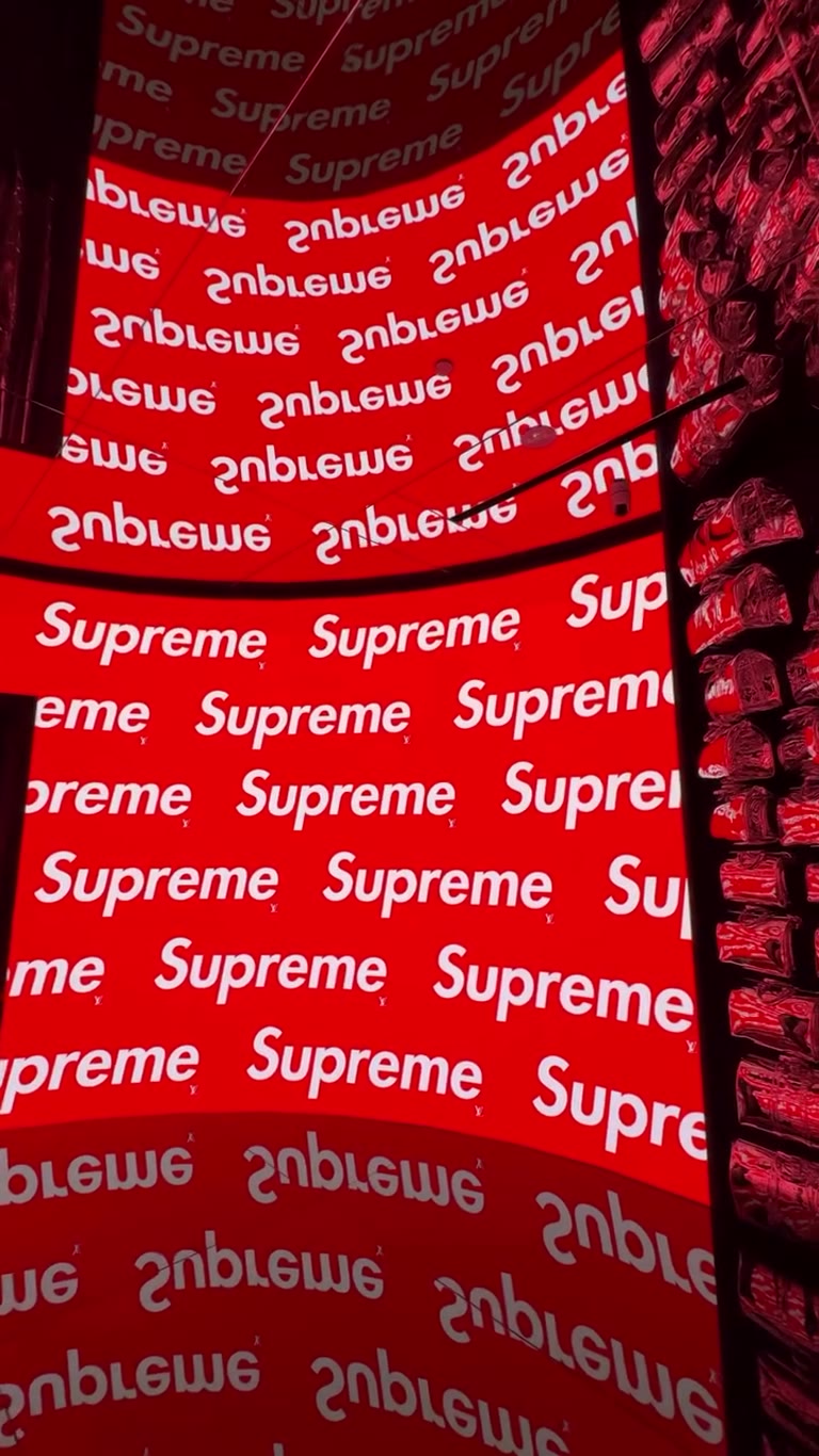 Supreme store's red logo wall in Bangkok