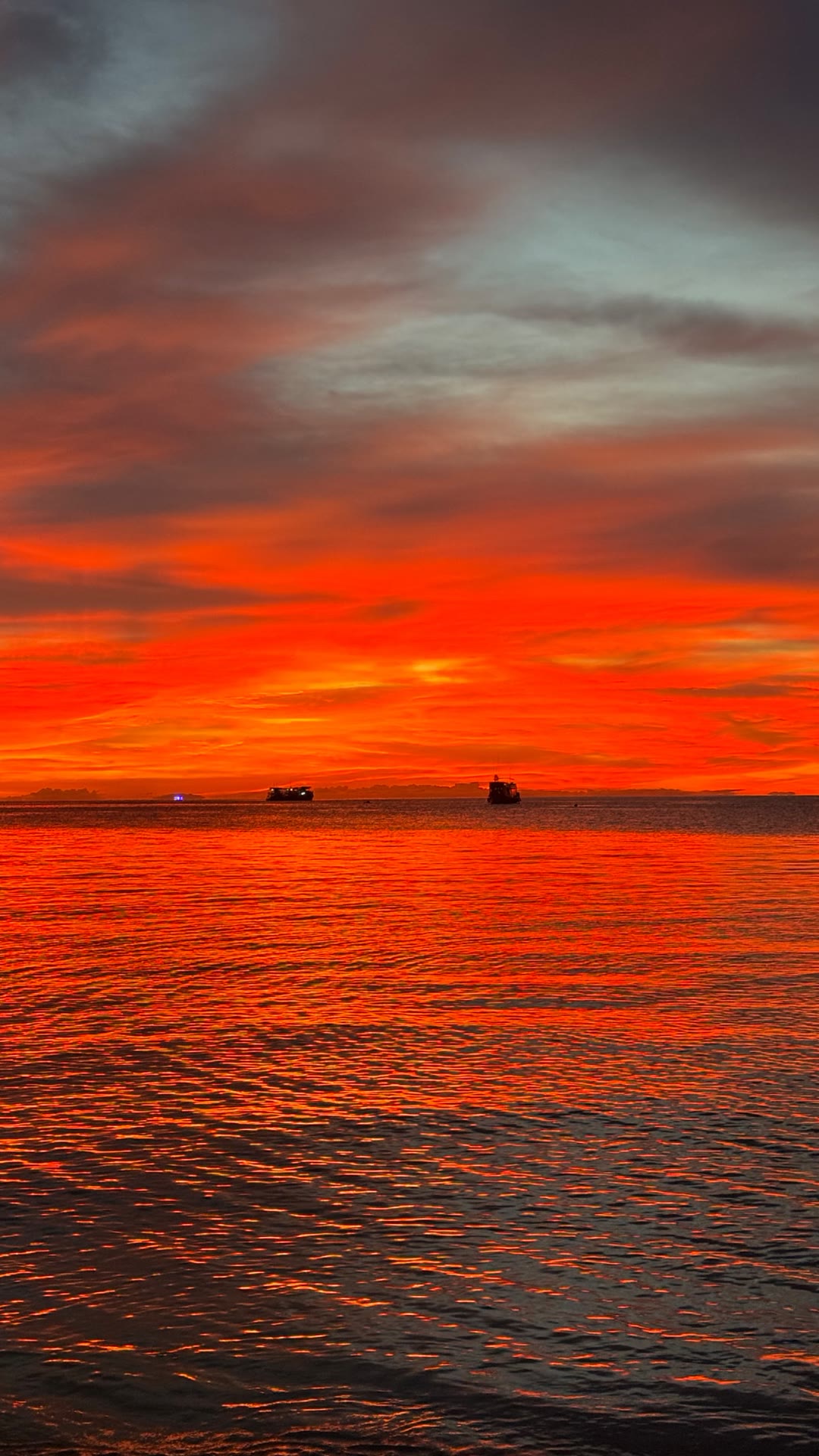 Fiery sunset over the sea in Koh Tao