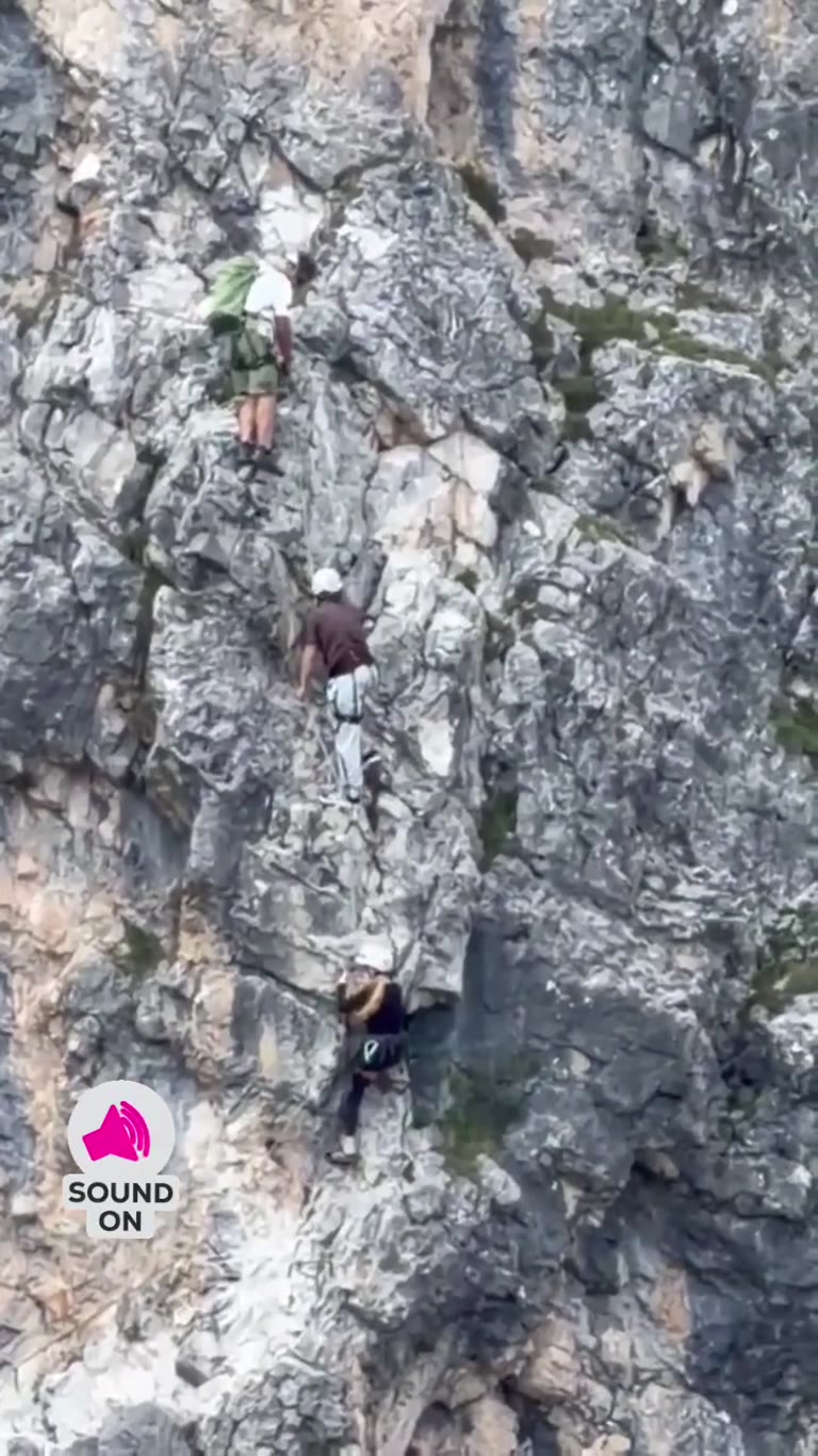 Via ferrata climb and spritz at a mountain hut, Italy