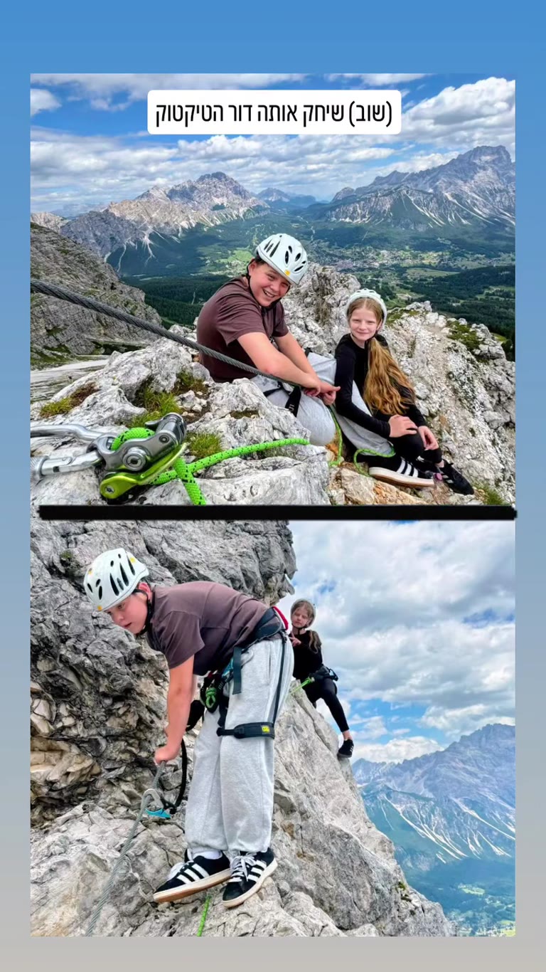 Kids on a via ferrata in the Dolomites