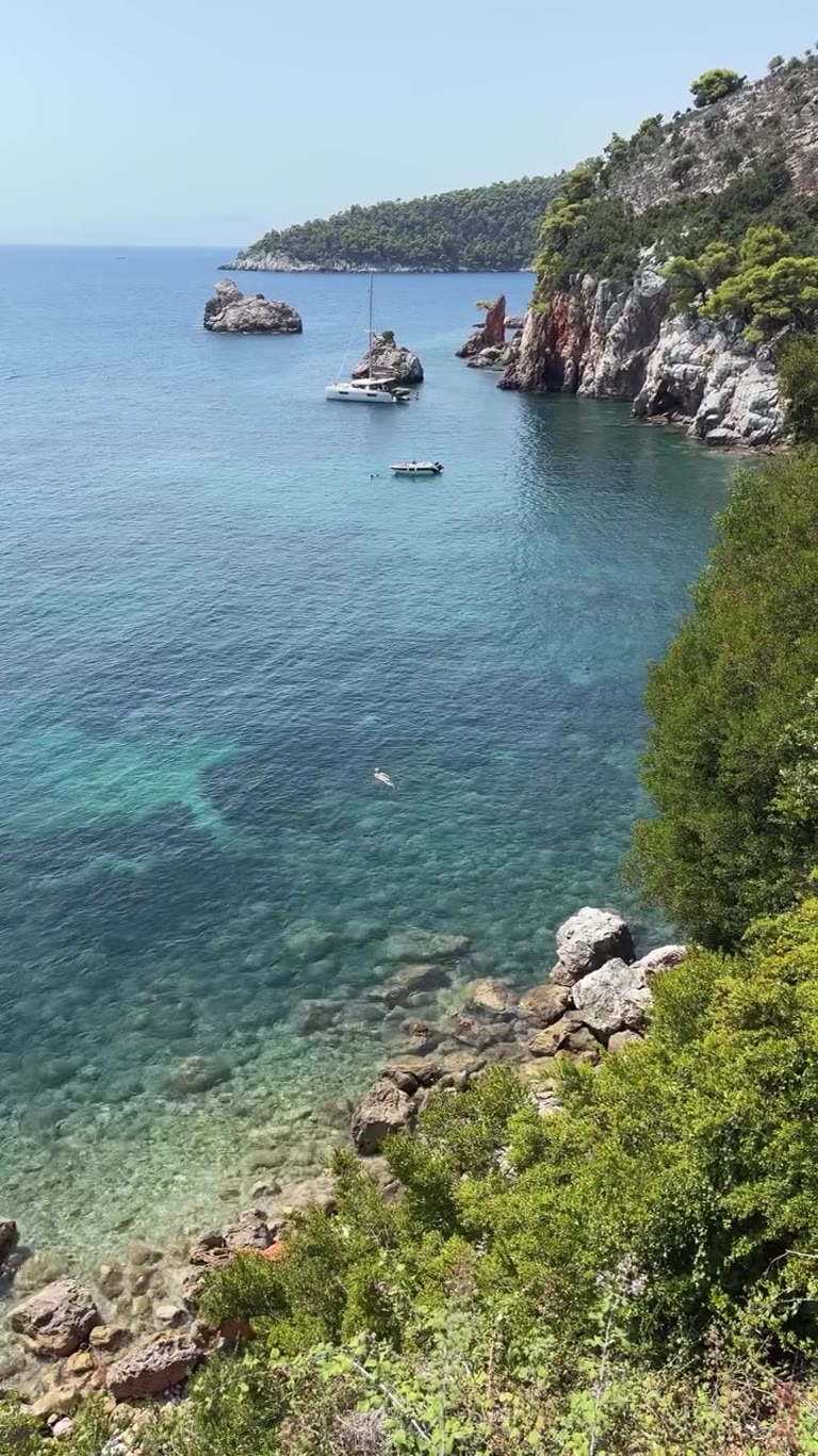 Turquoise cove from the cliffs on Skopelos