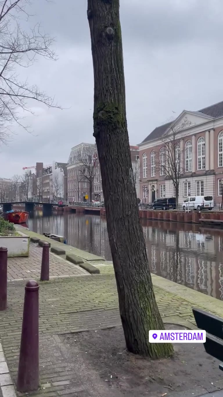 Grey-day canal walk in Amsterdam