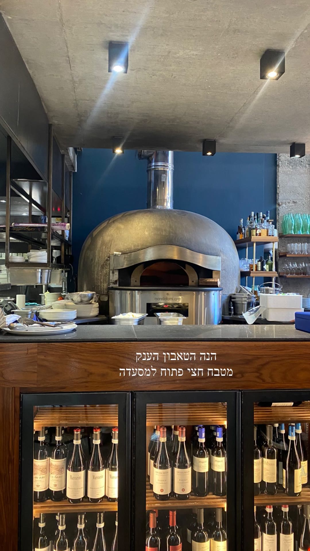 Giant pizza oven at a Paris pizzeria