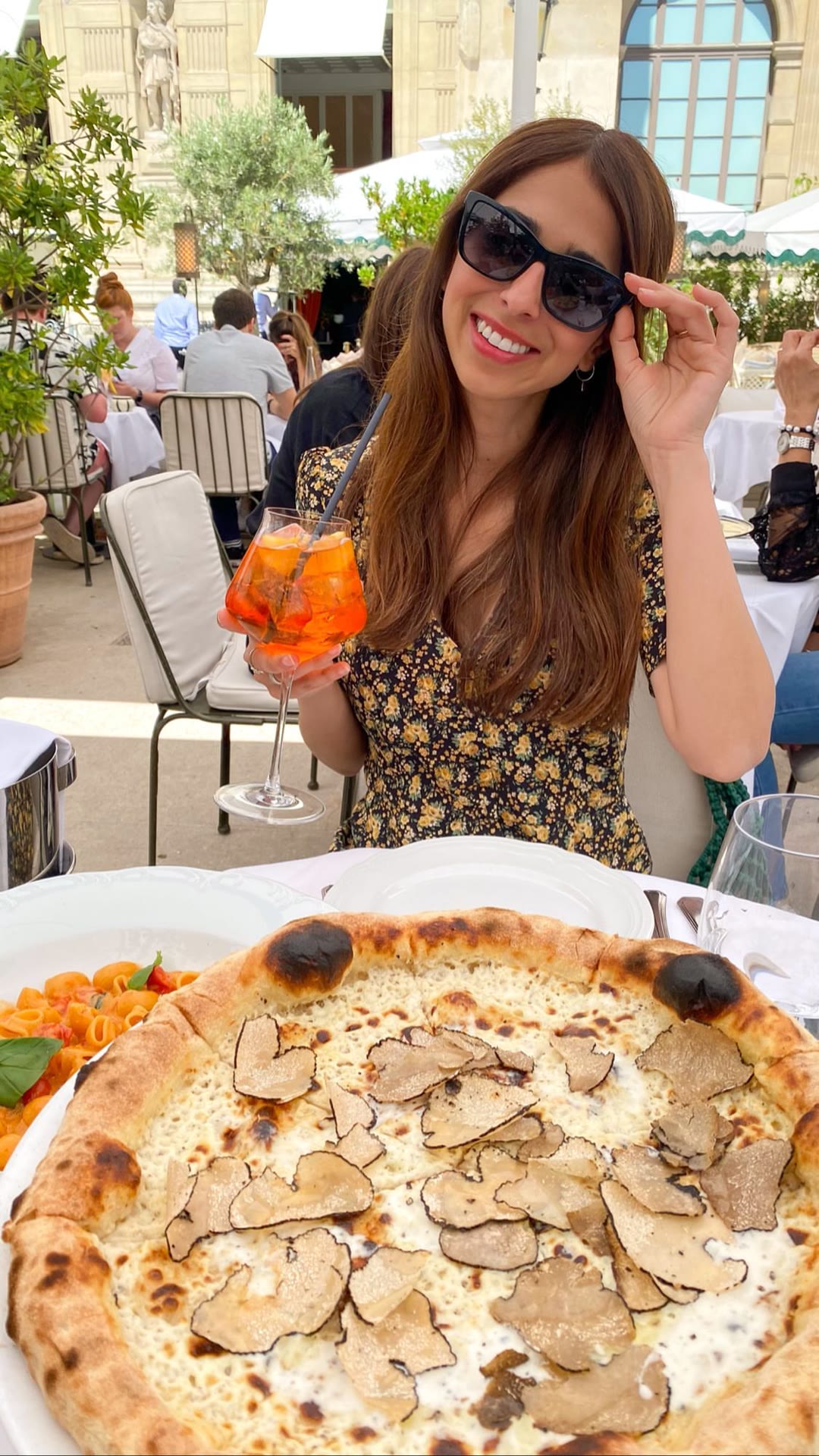 Truffle pizza on a Louvre courtyard terrace, Paris