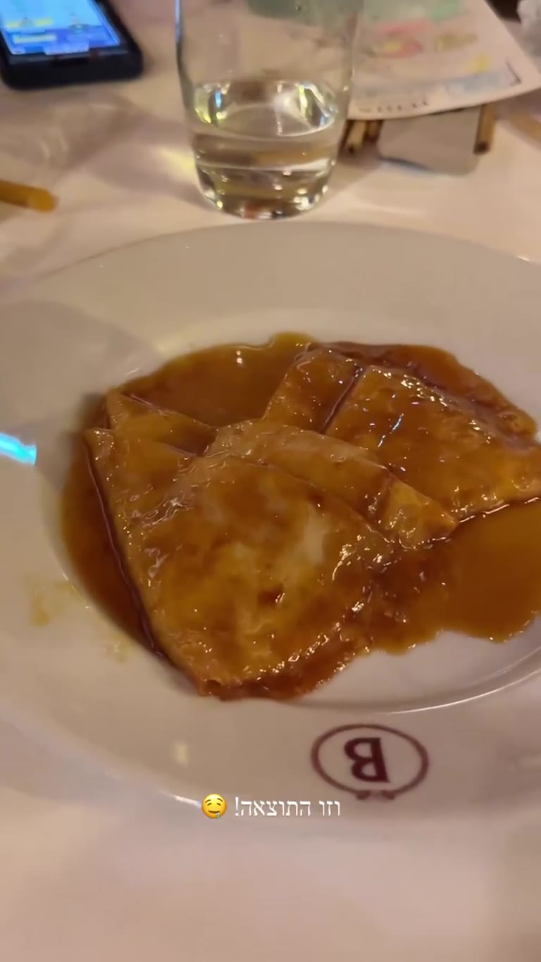 Crêpe Suzette flambée at a Paris brasserie