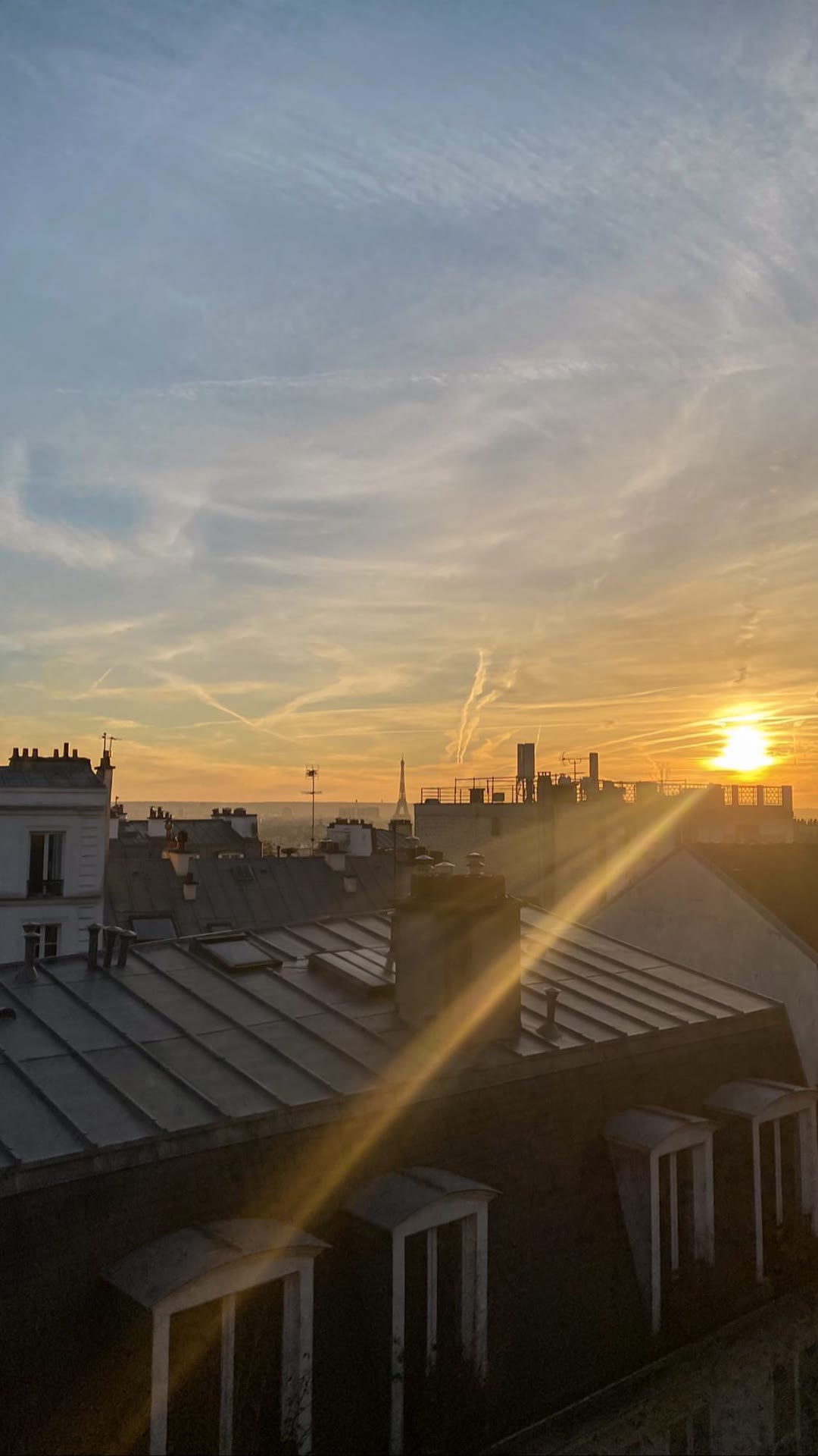 Paris rooftops at sunset from Montmartre