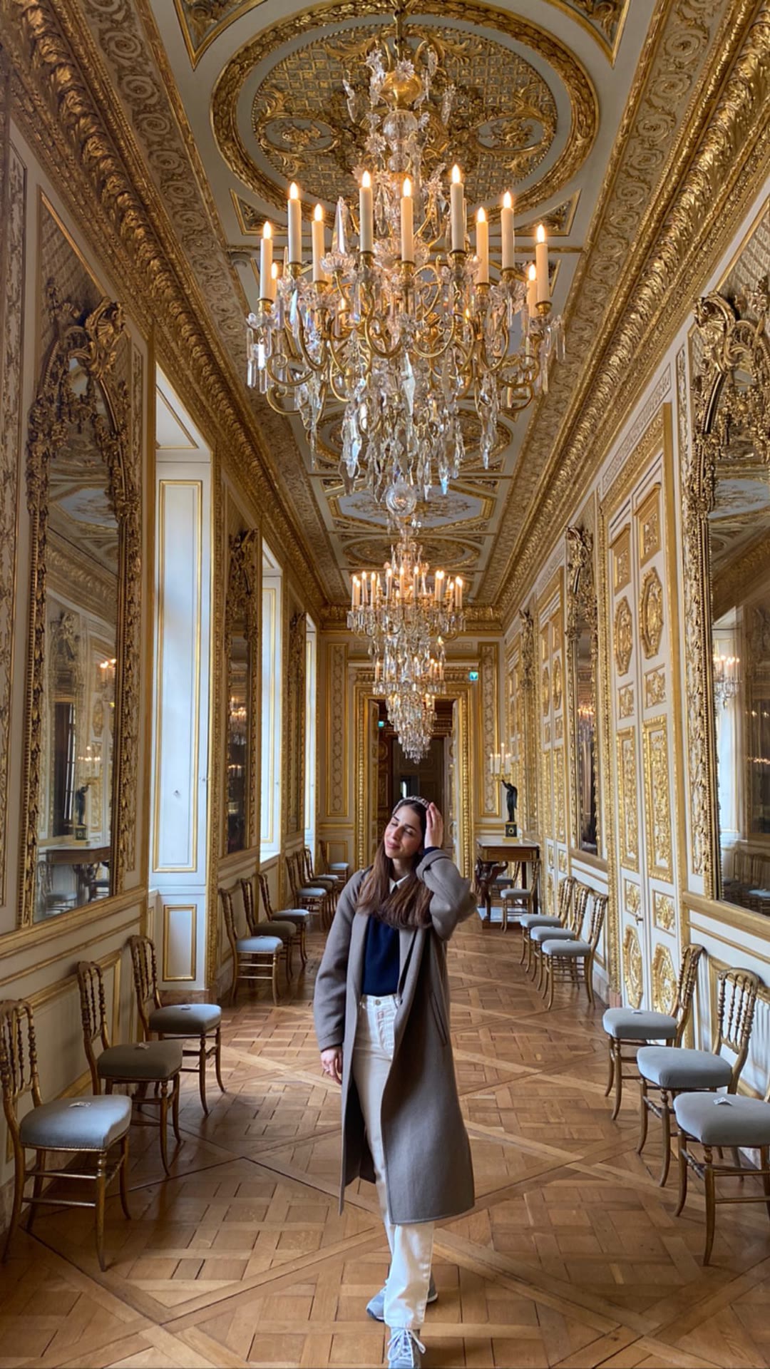Gilded chandelier gallery in a Paris museum