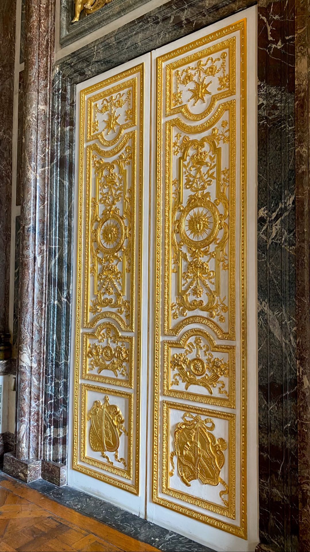 Gilded doors inside the Palace of Versailles