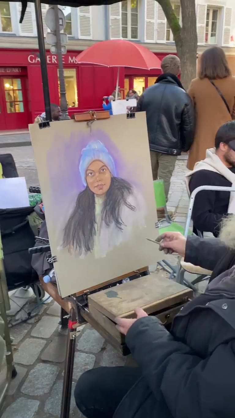 Portrait by a street artist at Place du Tertre