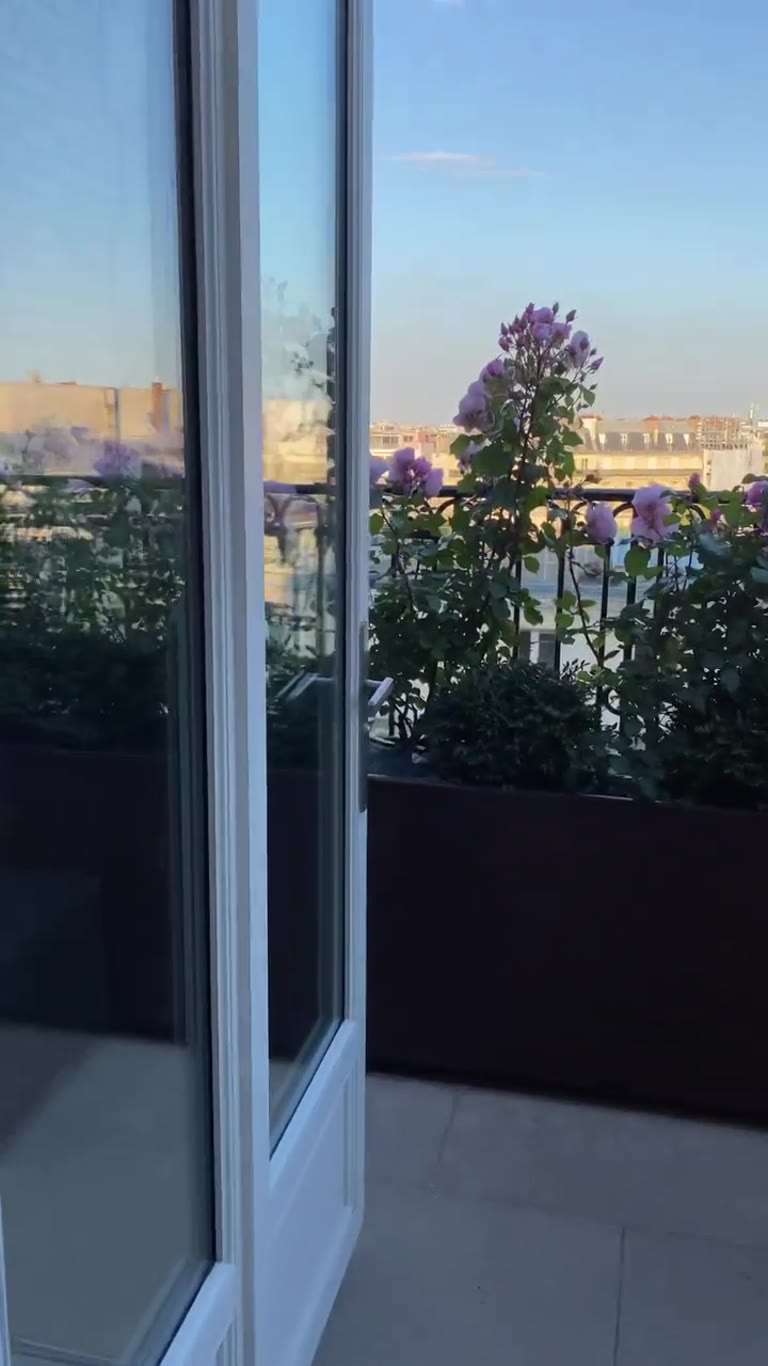 Paris rooftop bar with Eiffel Tower view