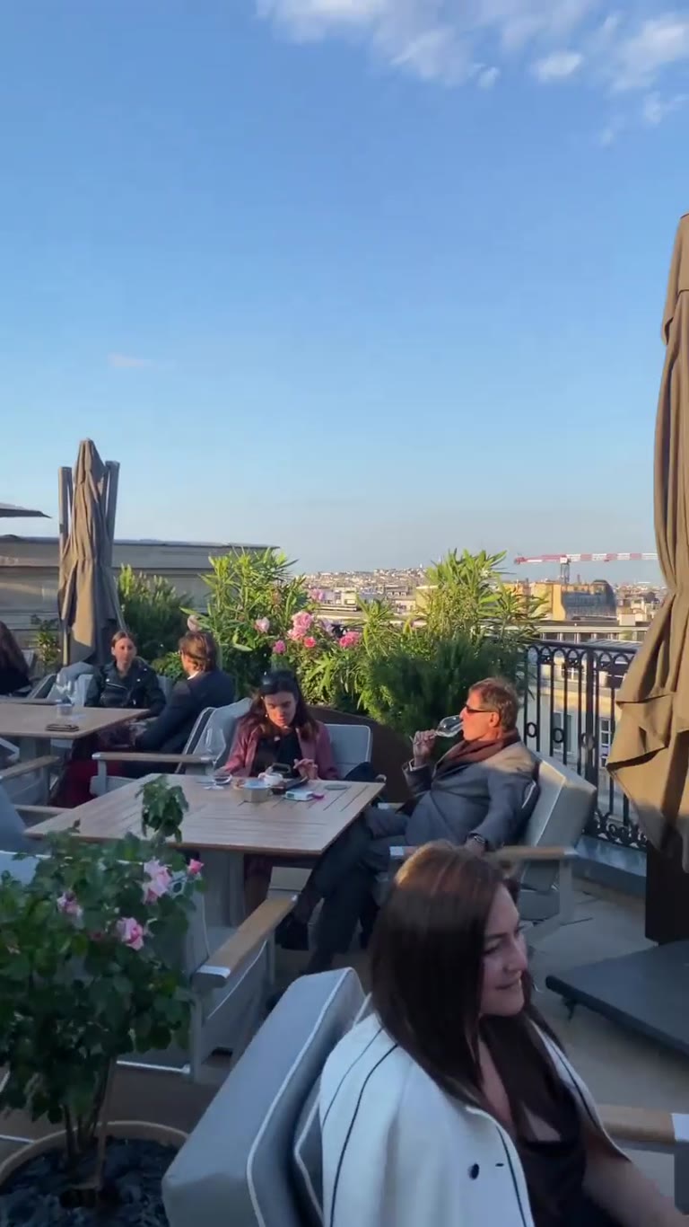 Sunset drinks on a Paris rooftop terrace