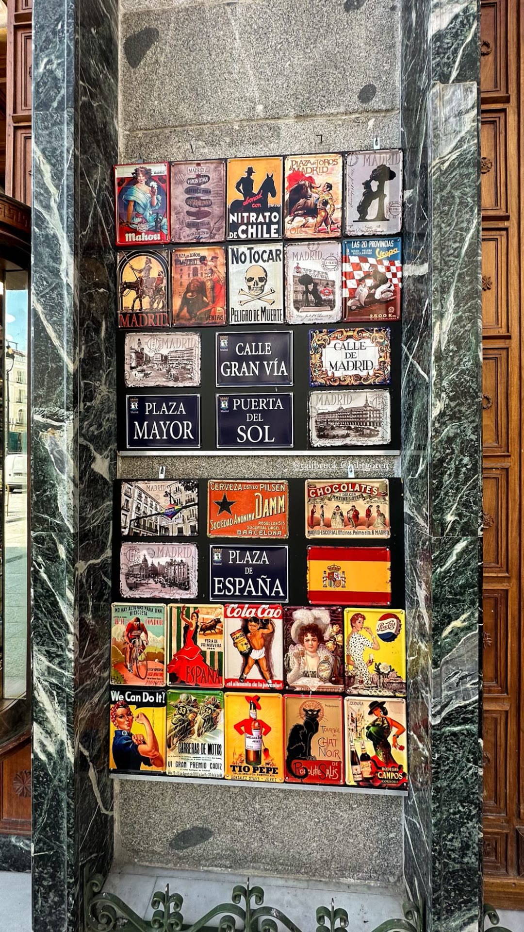 Vintage tin sign souvenir stand in Madrid