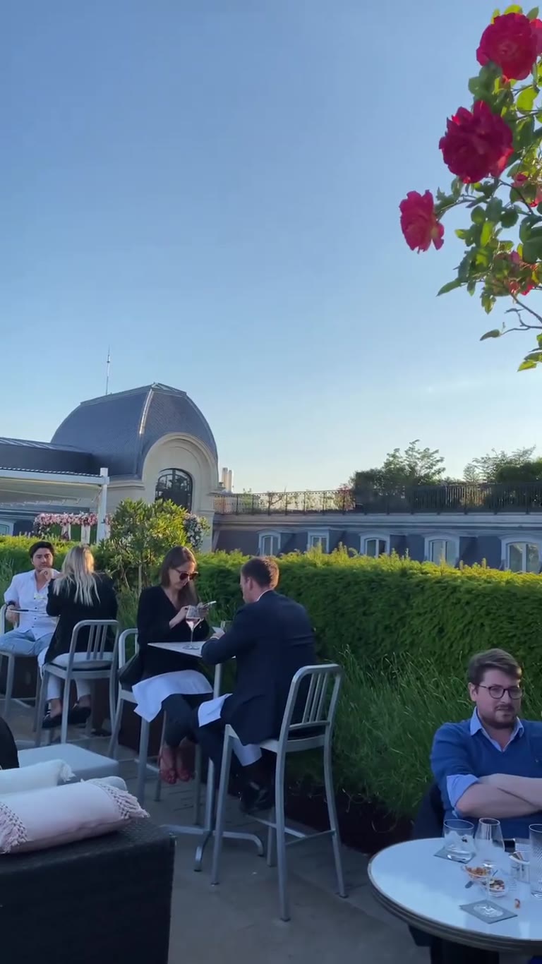 Rooftop drinks among the roses in Paris