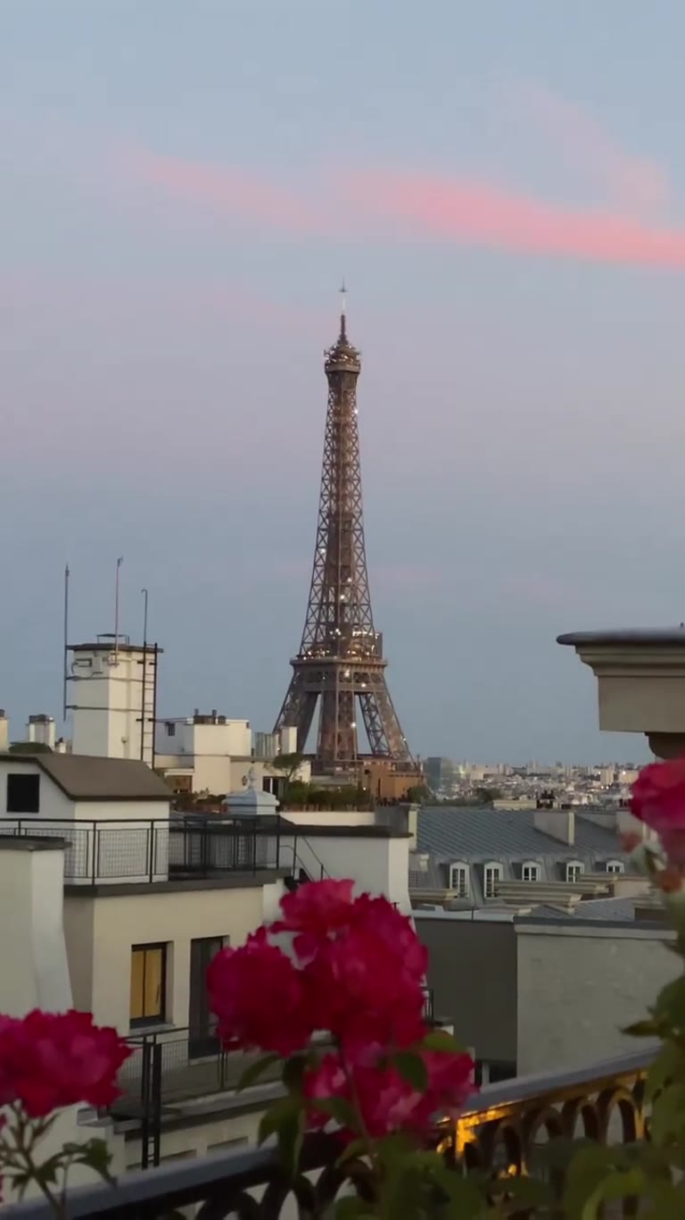 Eiffel Tower at dusk from a Paris rooftop