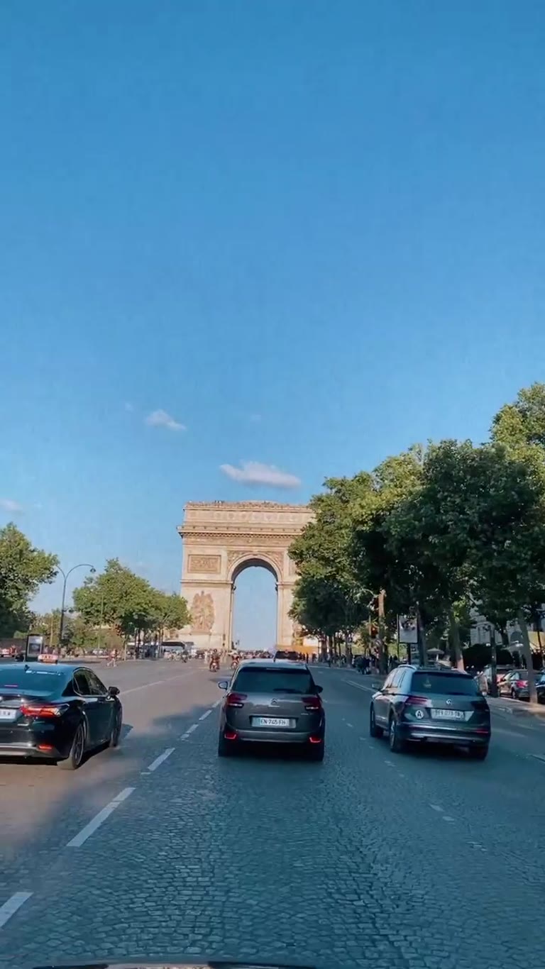 Driving up the Champs-Élysées to the Arc de Triomphe