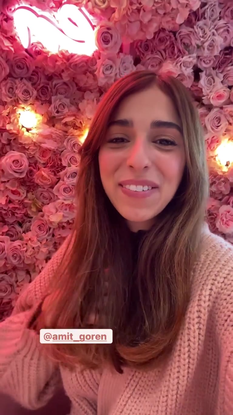 Pink flower-wall café in Paris